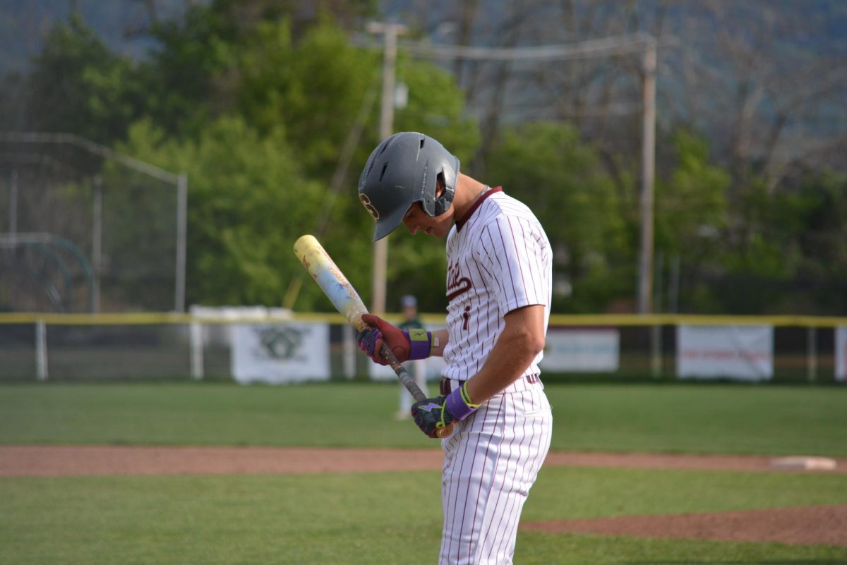 Senior center fielder Jake Hall steps up to the plate in the bottom of the second inning. “Baseball has impacted my life by being a huge thing, keeping my mind straight and working hard to accomplish my goals,” Hall said.