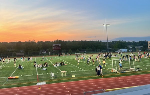 The sun sets on the South Track during State High's "Senior Sunset"